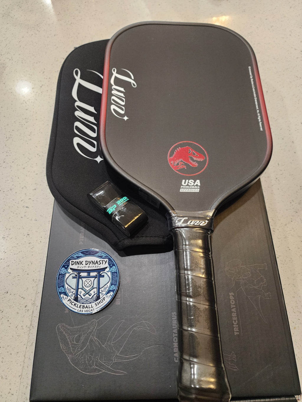 Luzz Cannon Jurassic World Edition Pickleball Paddle | T700 Raw Carbon Power Dink Dynasty